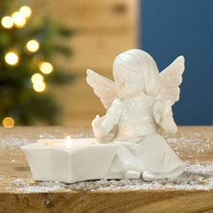 Svícen na čajovku sedící anděl